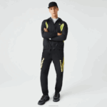 Lacoste Calça esportiva com blocos de cores de ajuste regular Heritage homens preto amarelo n07 88BL1110
