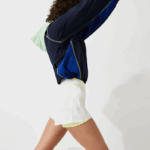 Lacoste shorts esportivos de náilon leve mulheres branco chamativo amarelo 6b2 88BL2659 - Image 2